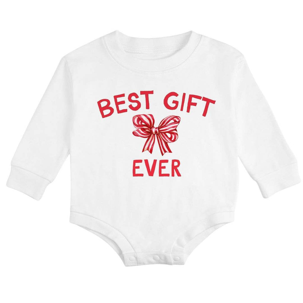 White baby onesie with red text and bow graphic on a white background