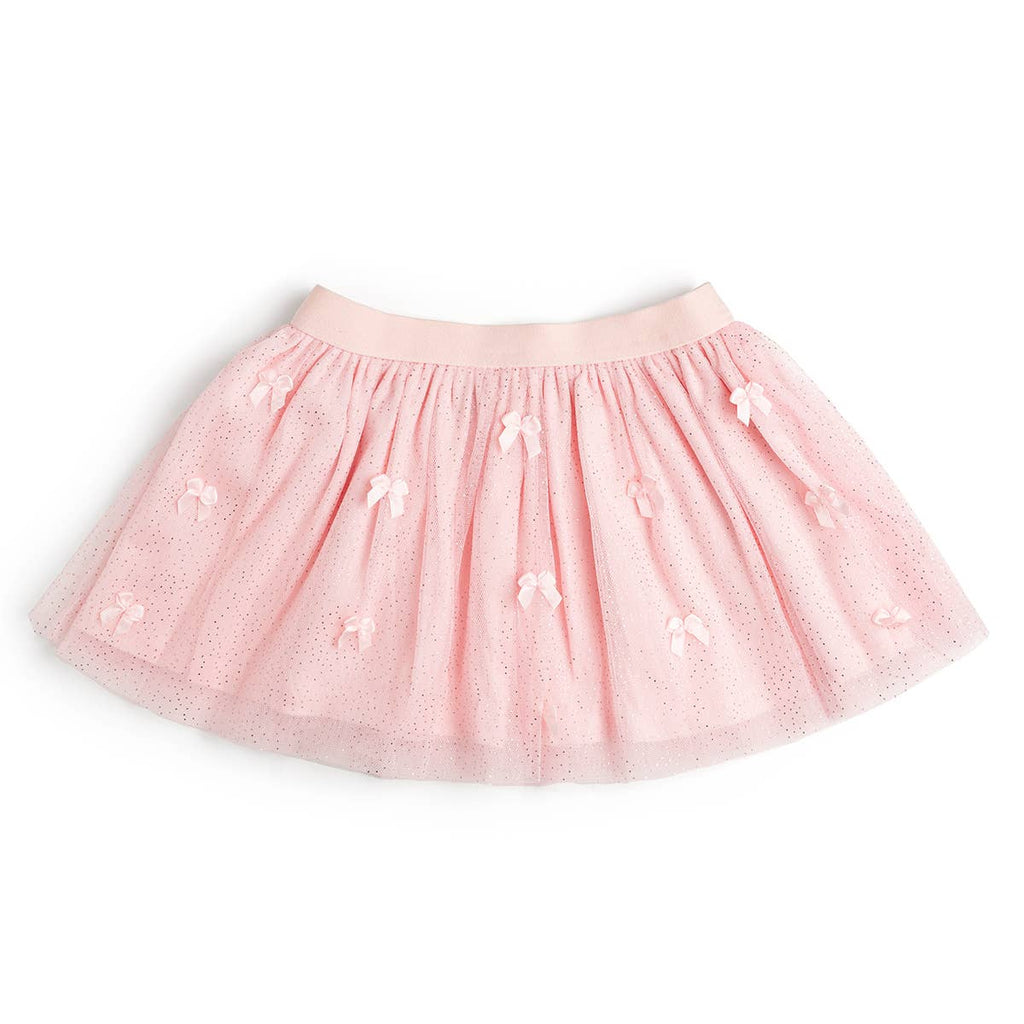 Pink tutu skirt with floral embellishments on a white background