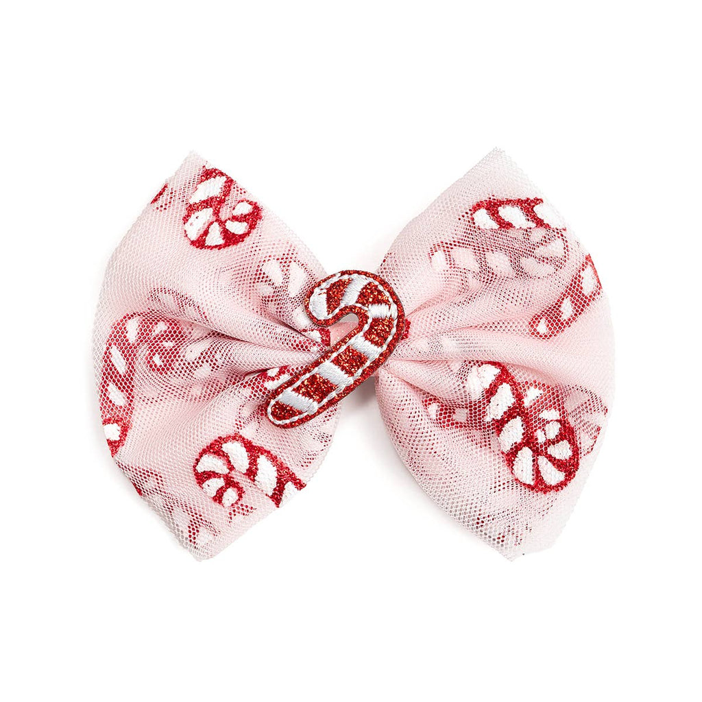 Pink bow with candy cane and peppermint pattern on a white background