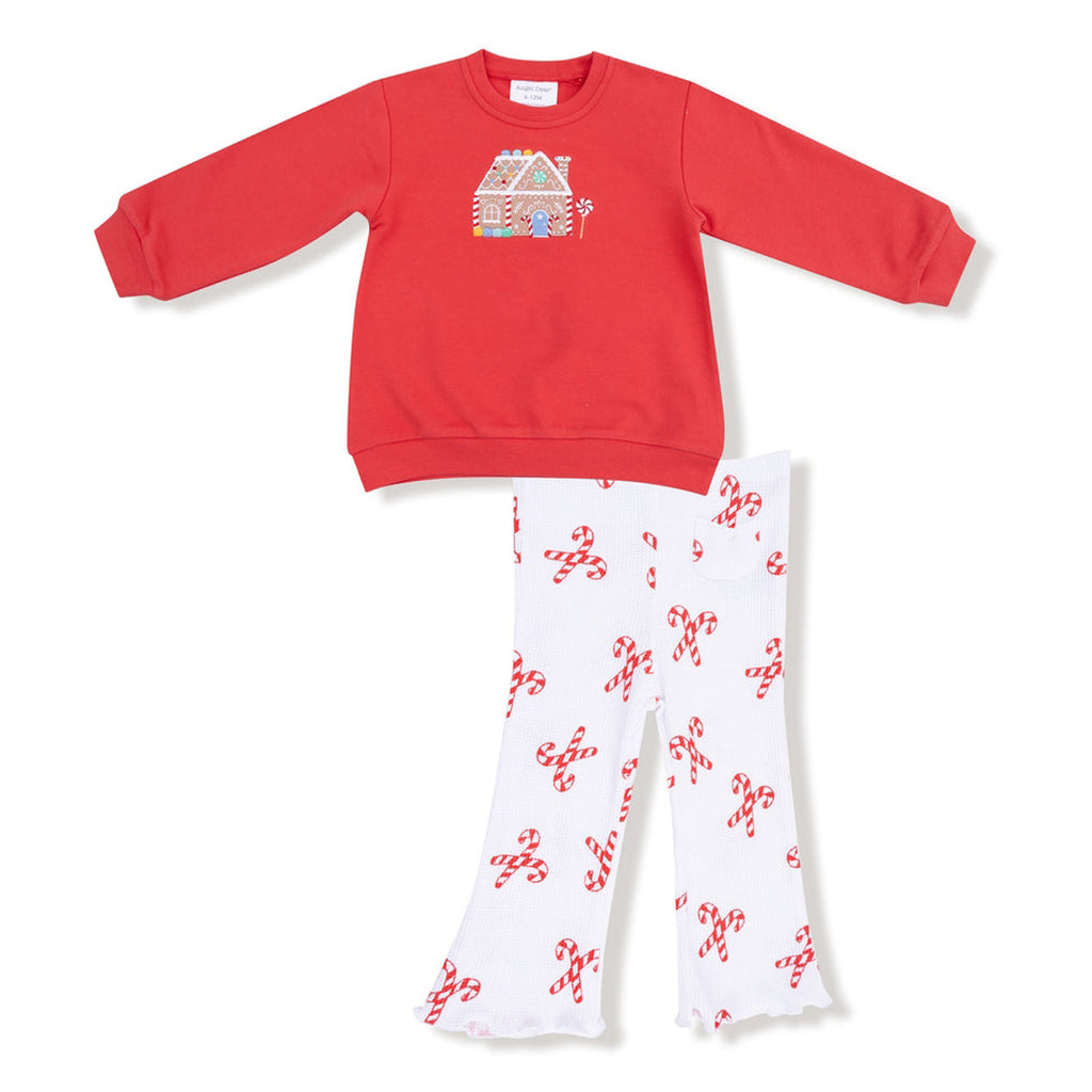 Red sweatshirt and white pants with red patterns on a white background