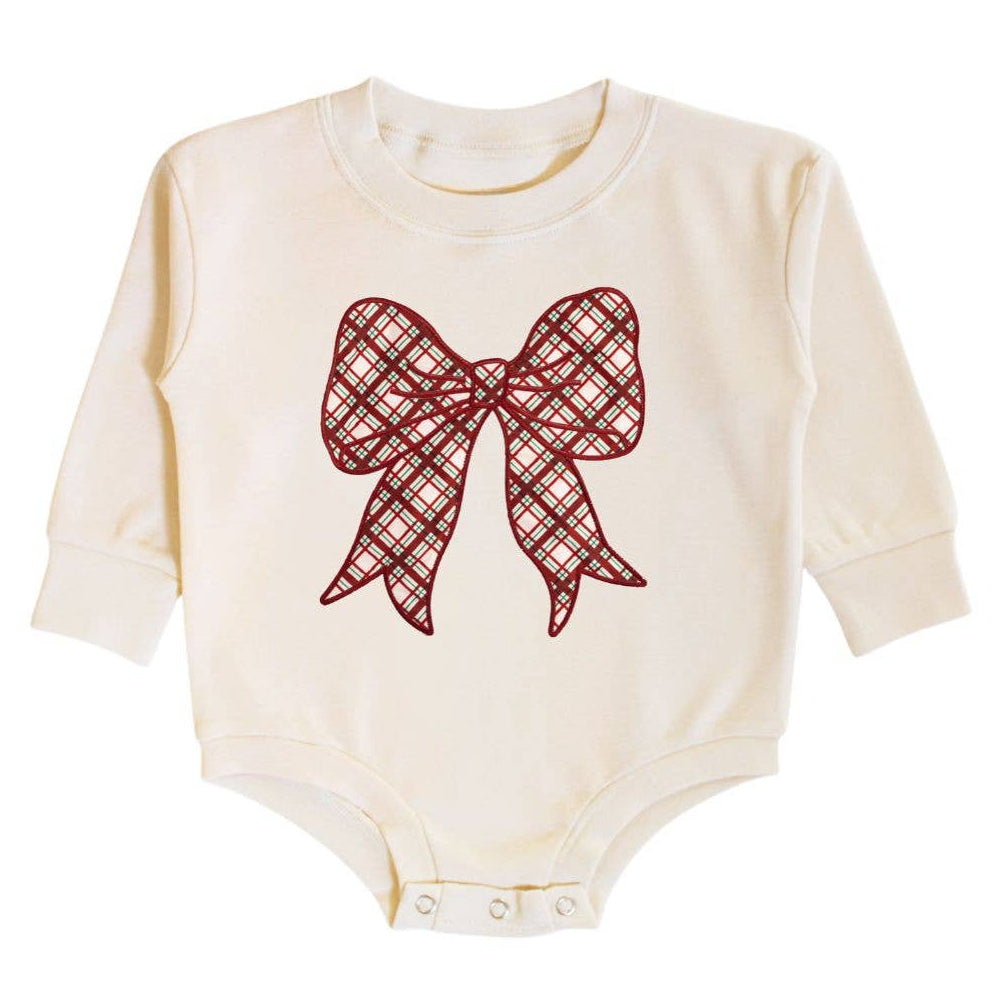 Baby onesie with a red plaid bow design on a white background