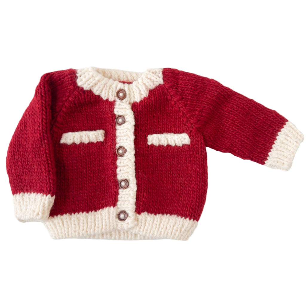 Red and white knitted cardigan on a white background