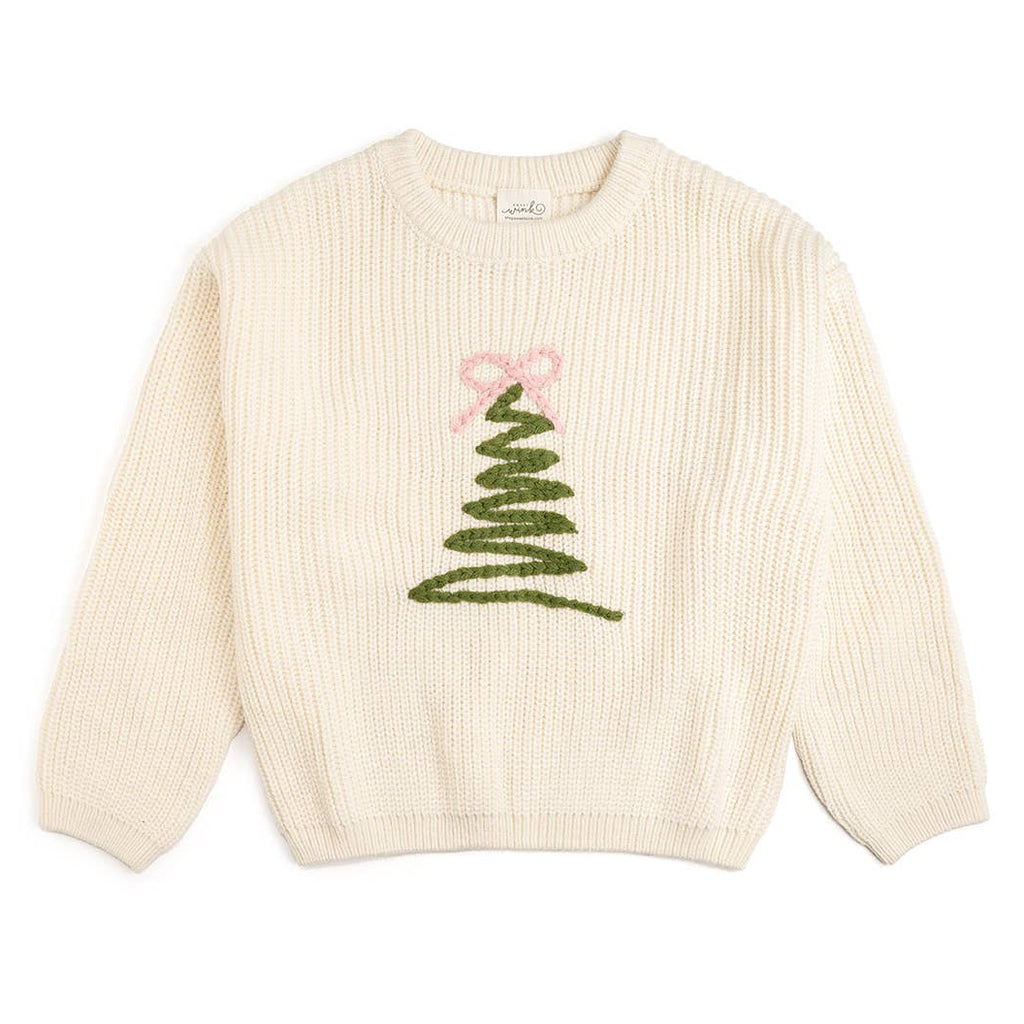 Beige sweater with a green Christmas tree design on a white background