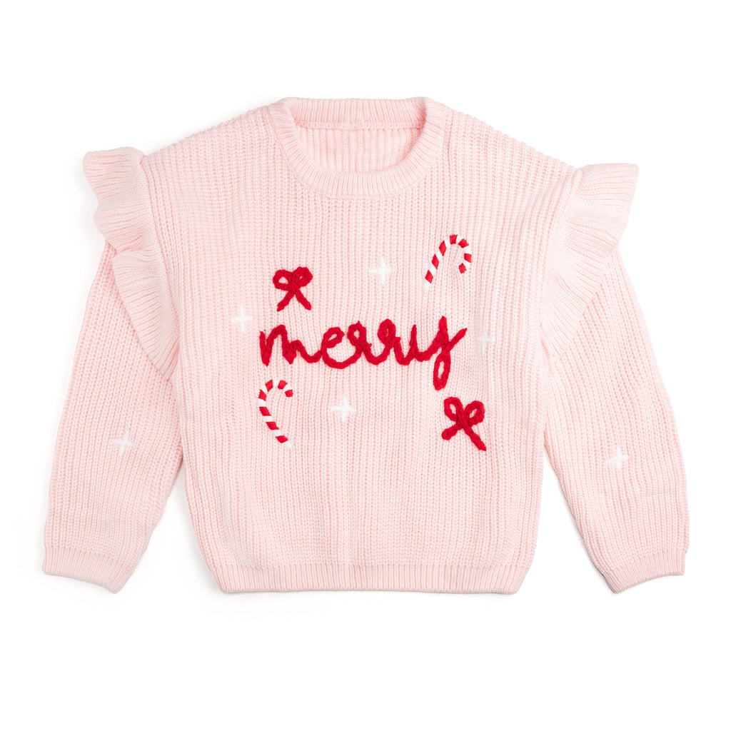 Pink sweater with 'merry' text and candy cane design on a white background
