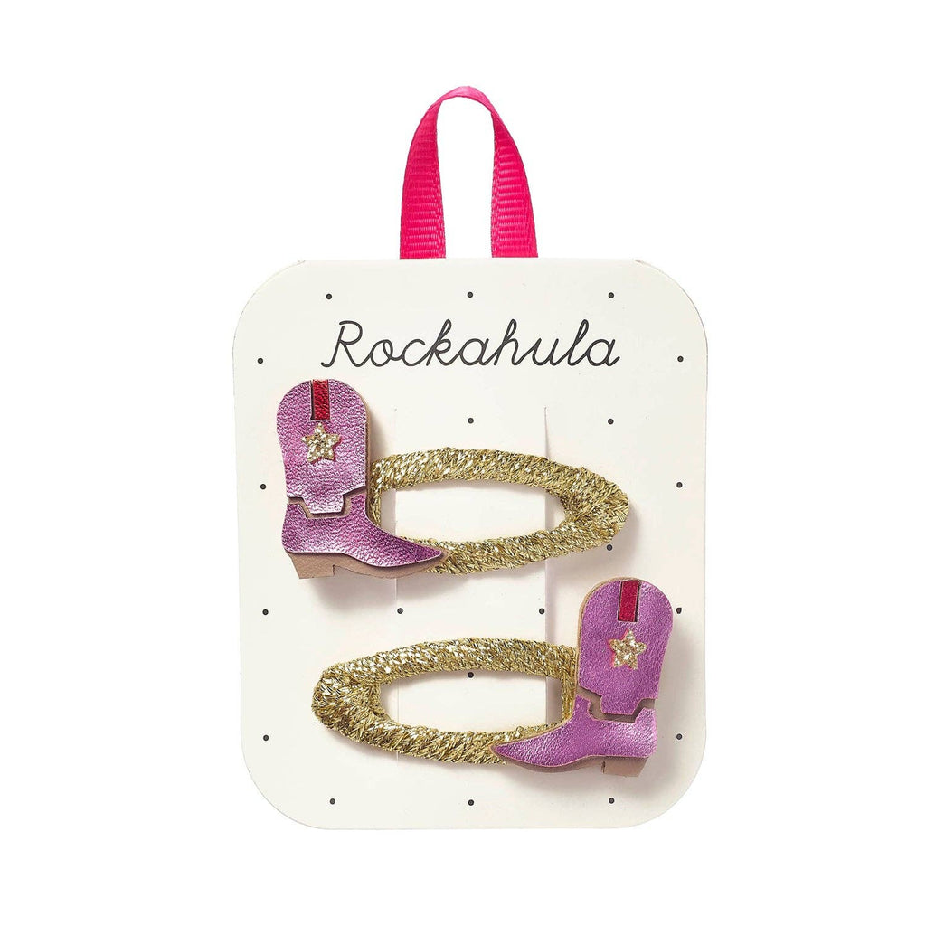Pink and gold cowboy boot hair clips on a Rockahula branded card.