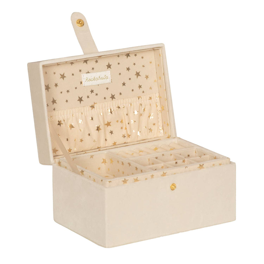 Beige jewelry box with star patterns on a white background