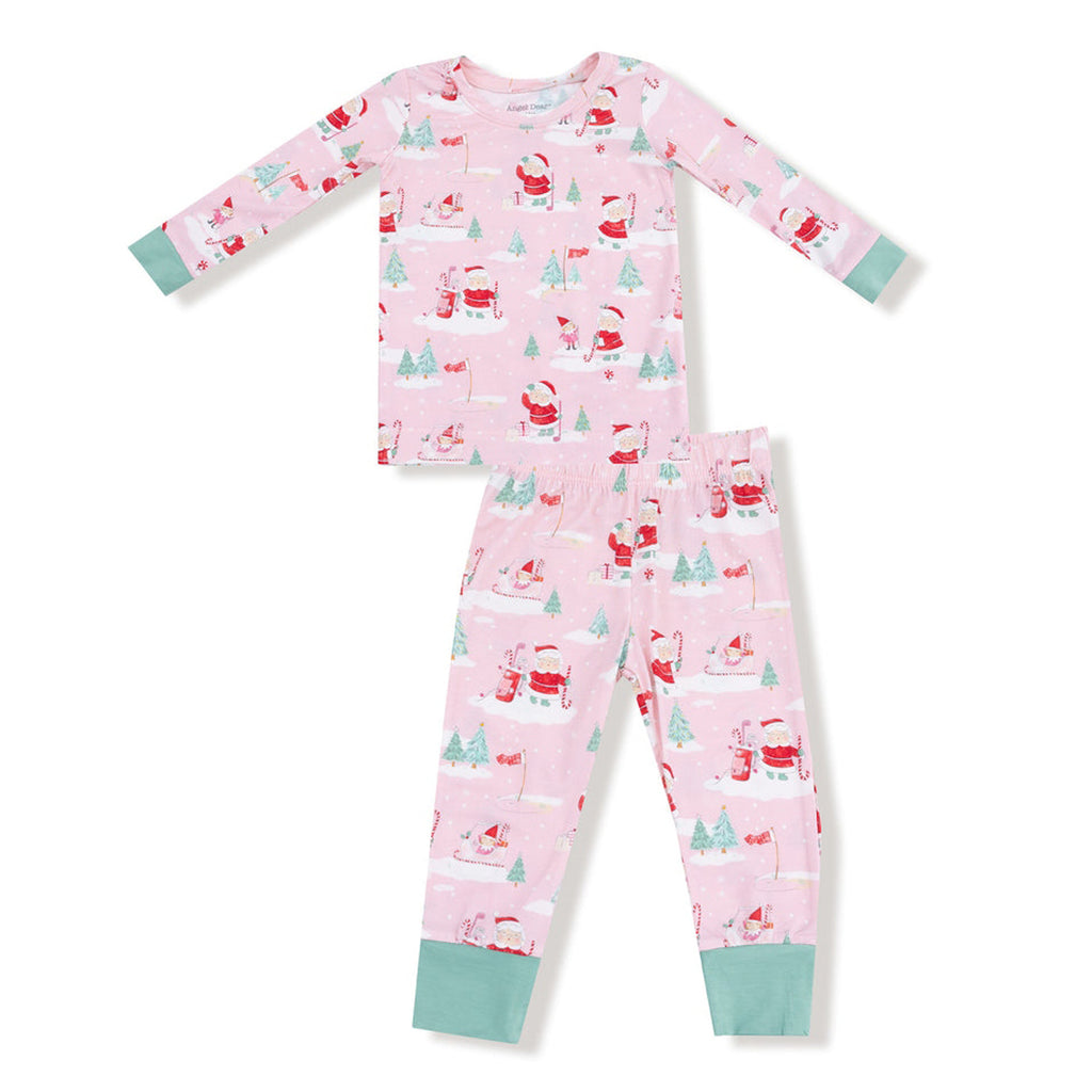 Children's pajama set with festive pattern on a white background