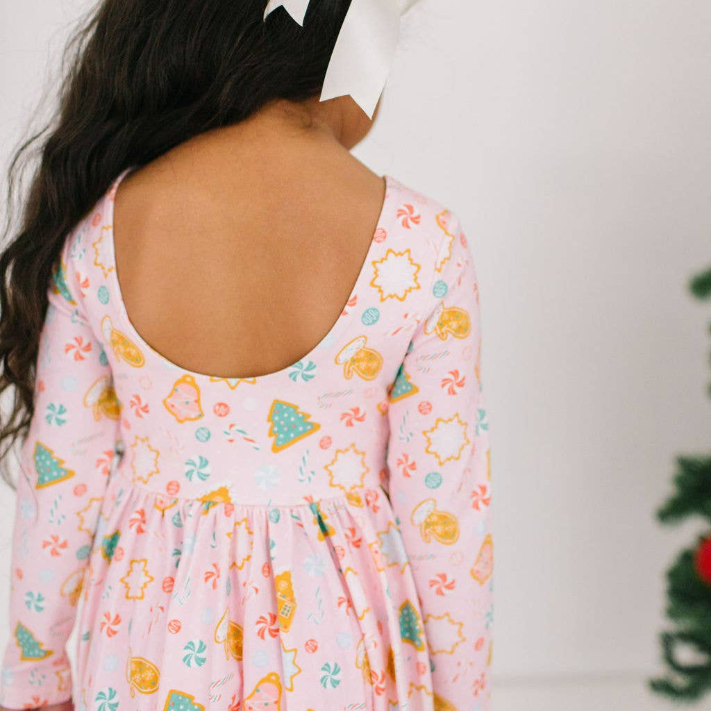 Woman wearing a floral dress with a white background