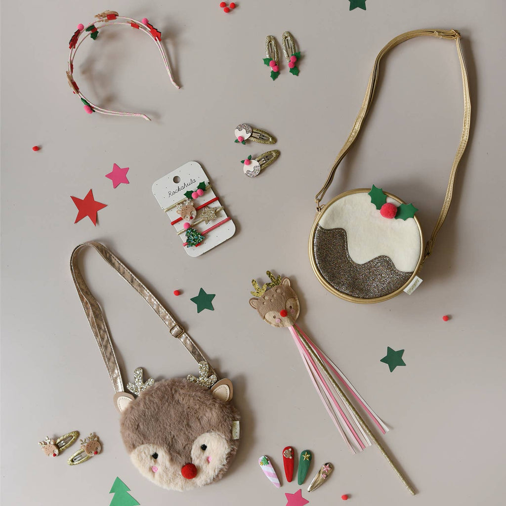 Collection of festive accessories including bags, headbands, and hair clips on a neutral background.