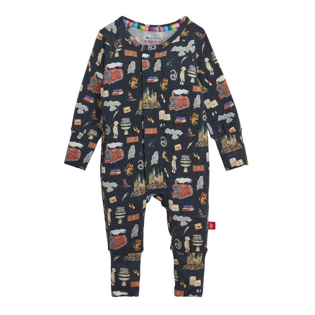 Children's onesie with travel-themed pattern on a white background