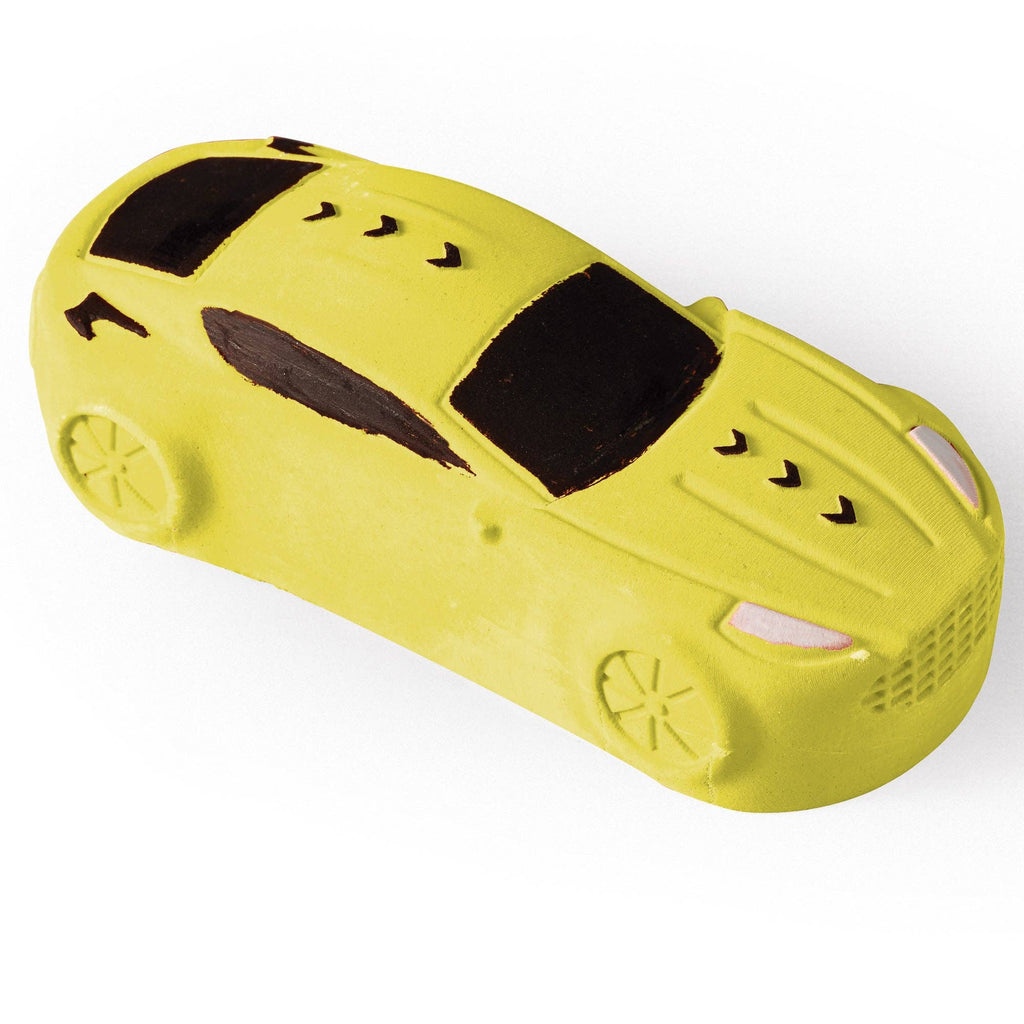 Yellow toy car with black details on a white background