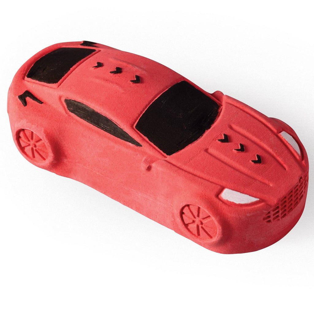 Red toy car on a white background