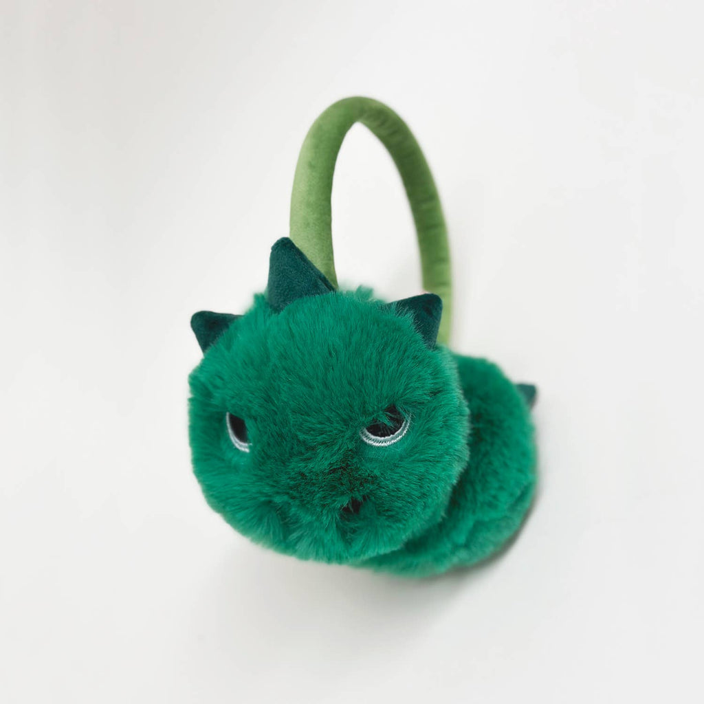 Green dinosaur-shaped ear muffs on a white background